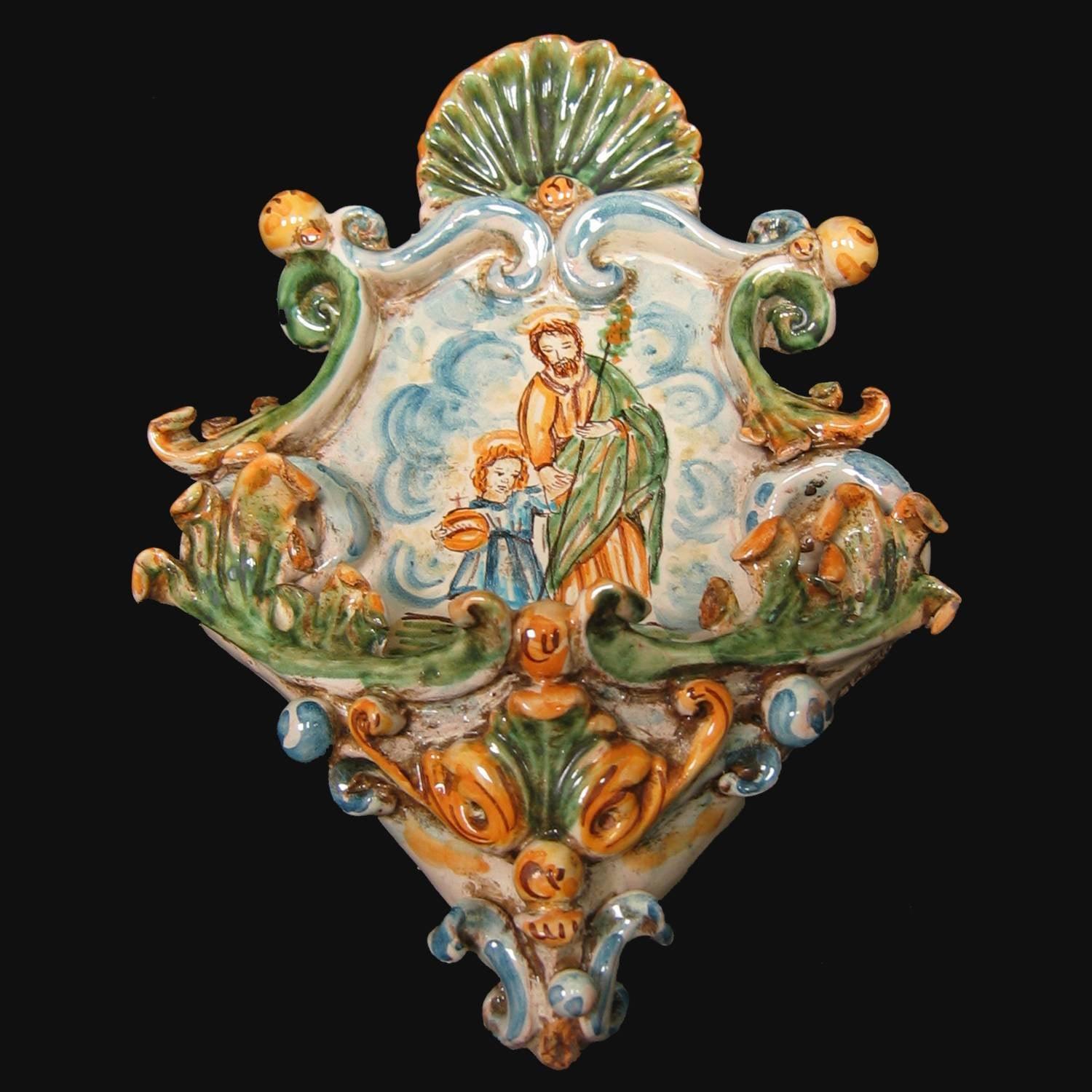 Ceramiche di Caltagirone fatti a mano con raffigurazione religiosa e decori barocchi colorati
