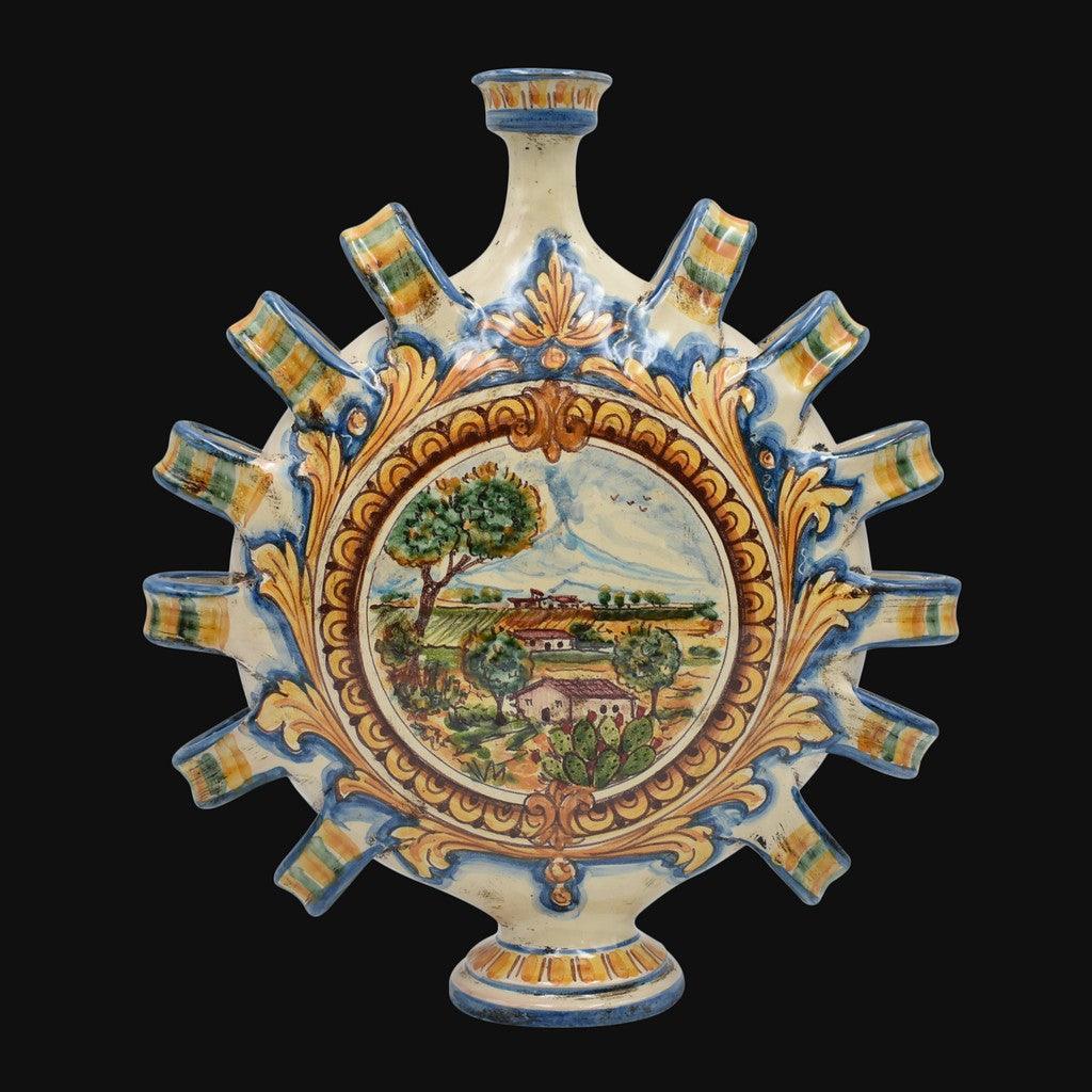 Ceramiche di Caltagirone fatti a mano con decoro paesaggio siciliano e motivi colorati