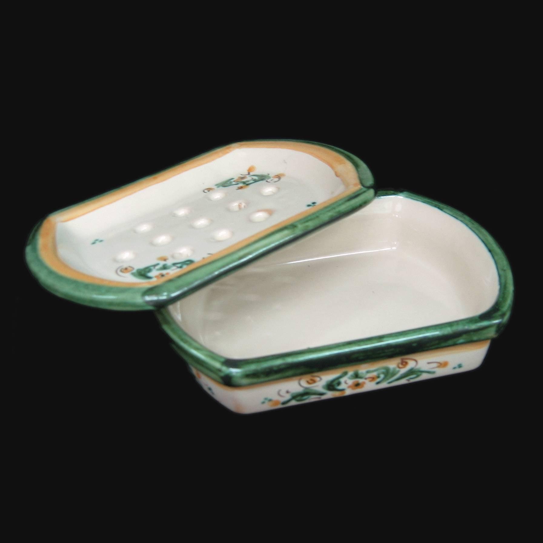 Ceramiche di Caltagirone fatti a mano, portasapone con decori floreali verdi e arancioni su sfondo nero