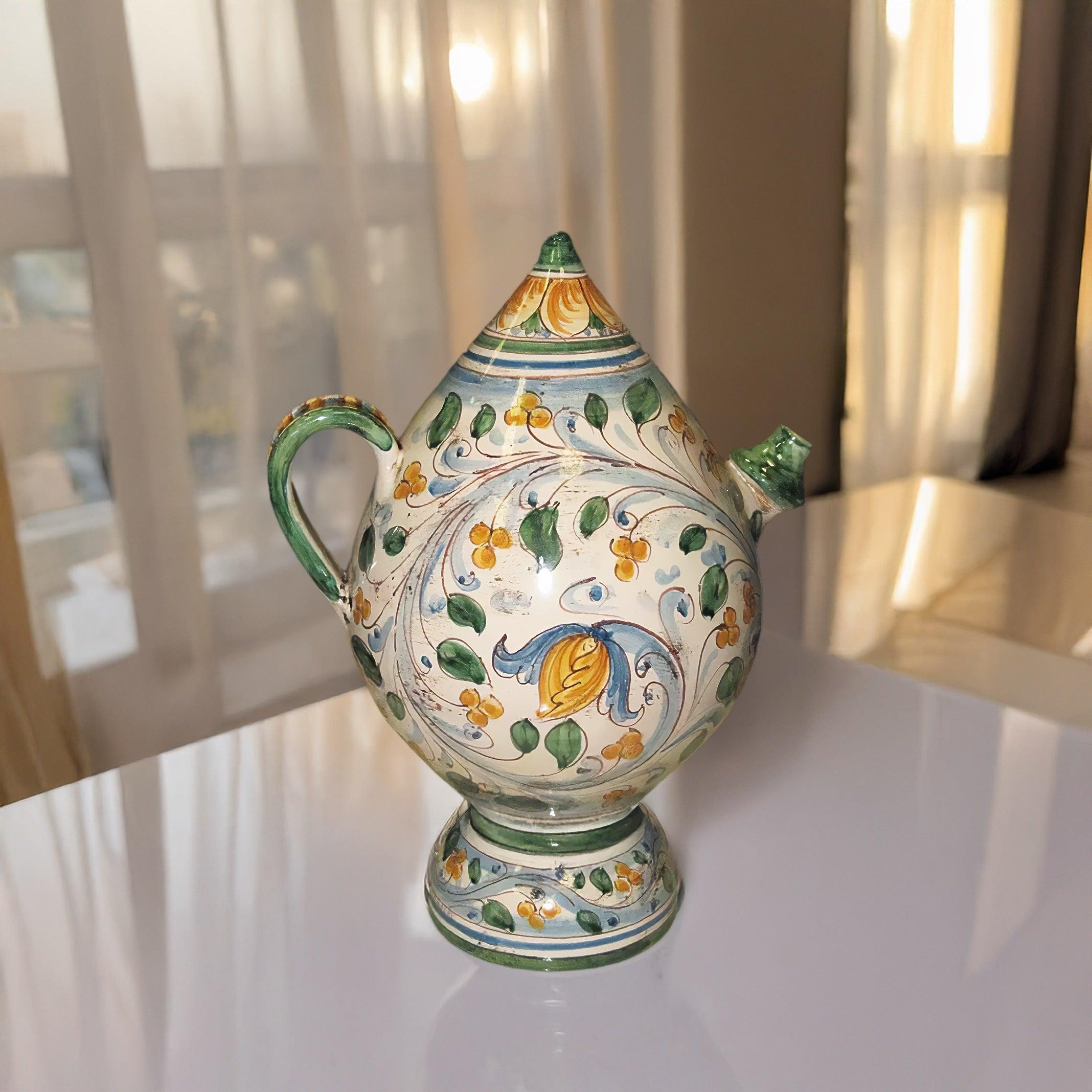 Bummulu Malandrino in ceramica artistica di Caltagirone, decorato a mano con motivi fogliame.