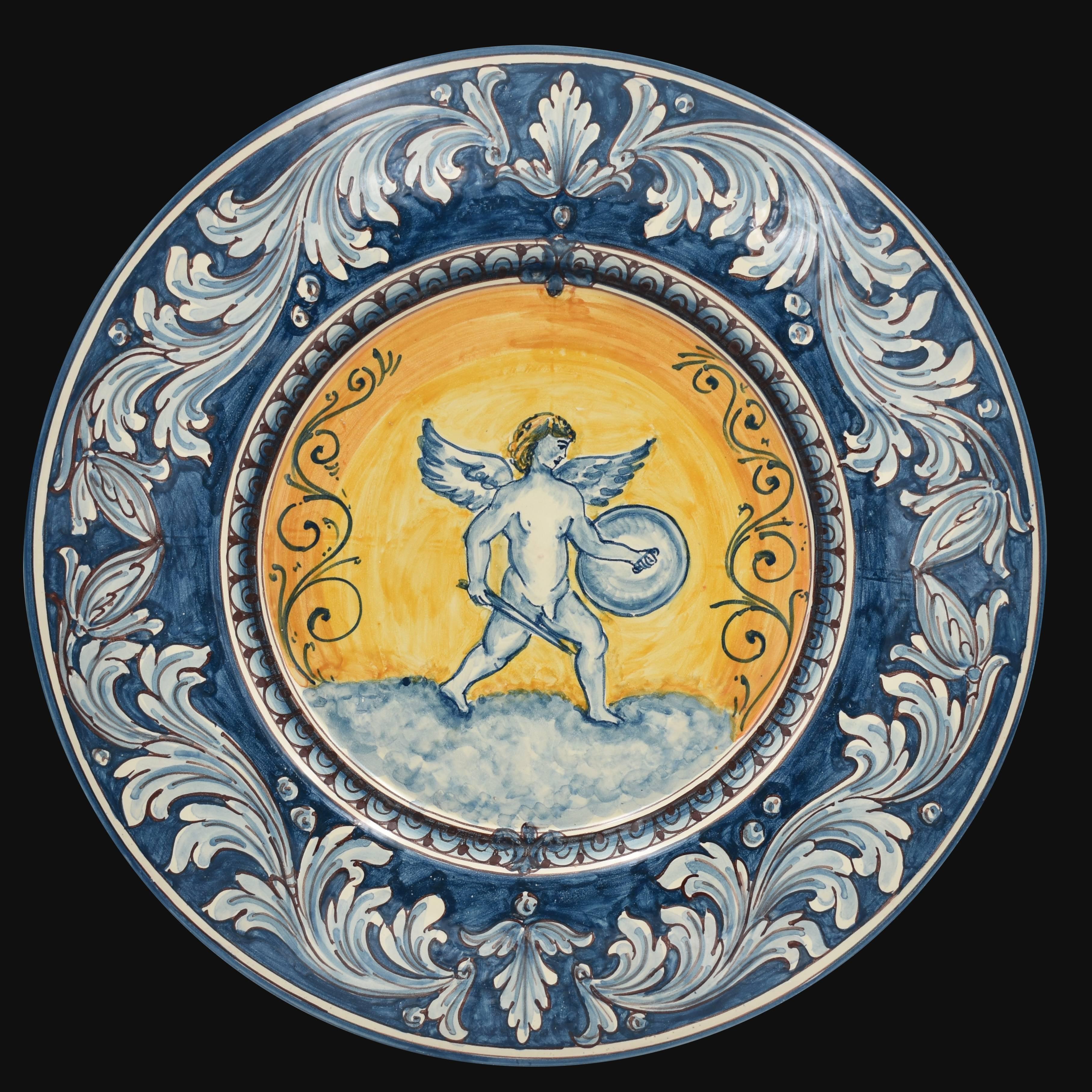 Piatto in ceramica di Caltagirone fatta a mano con angelo blu e giallo, decoro barocco