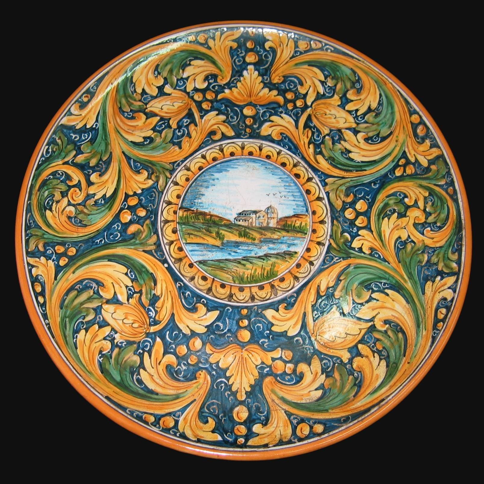 Piatto in ceramica di Caltagirone fatta a mano con decori floreali e paesaggio centrale