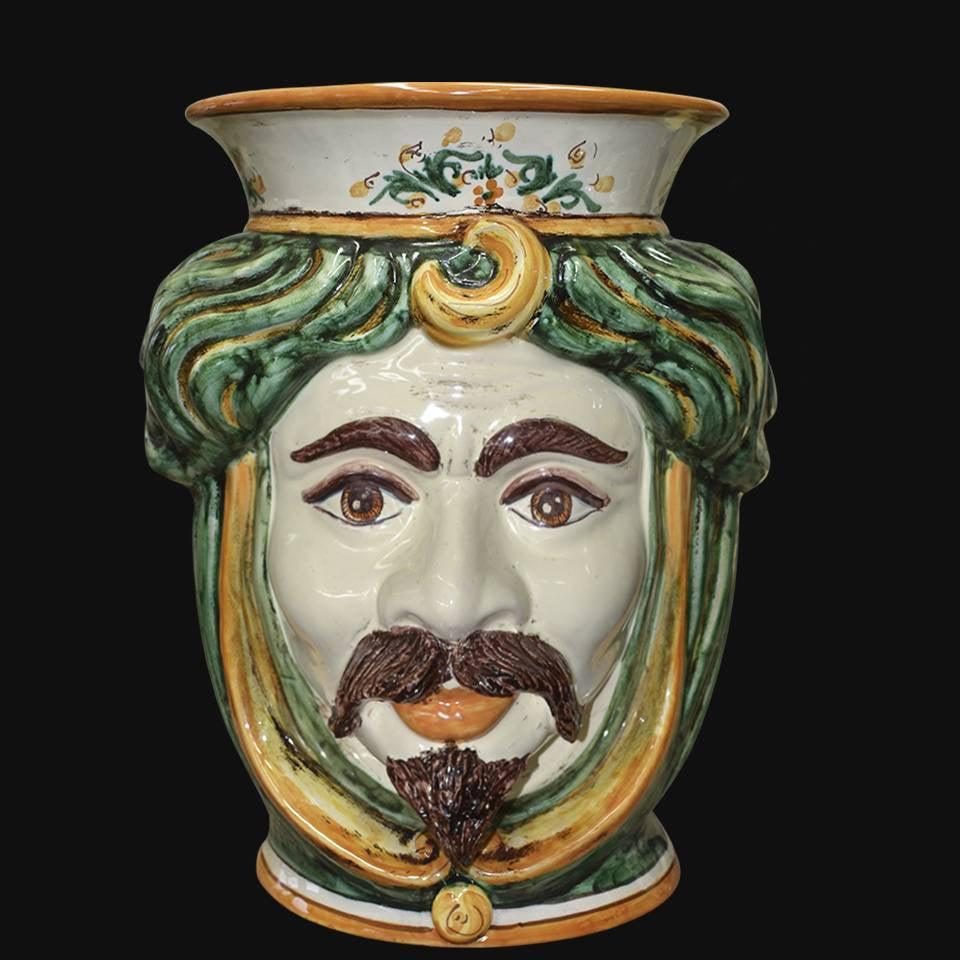 Ceramica di Caltagirone fatta a mano con volto barbuto e capelli verdi, arte tradizionale siciliana
